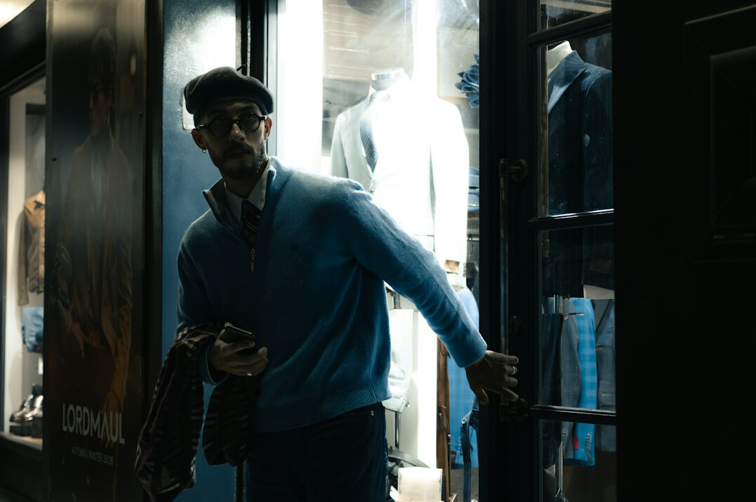 store detective watching thief