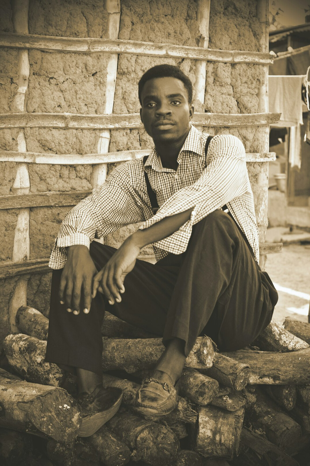 Studio portrait of a Uruguayan man in his early 40s, detective fiction writer, glasses, thoughtful expression