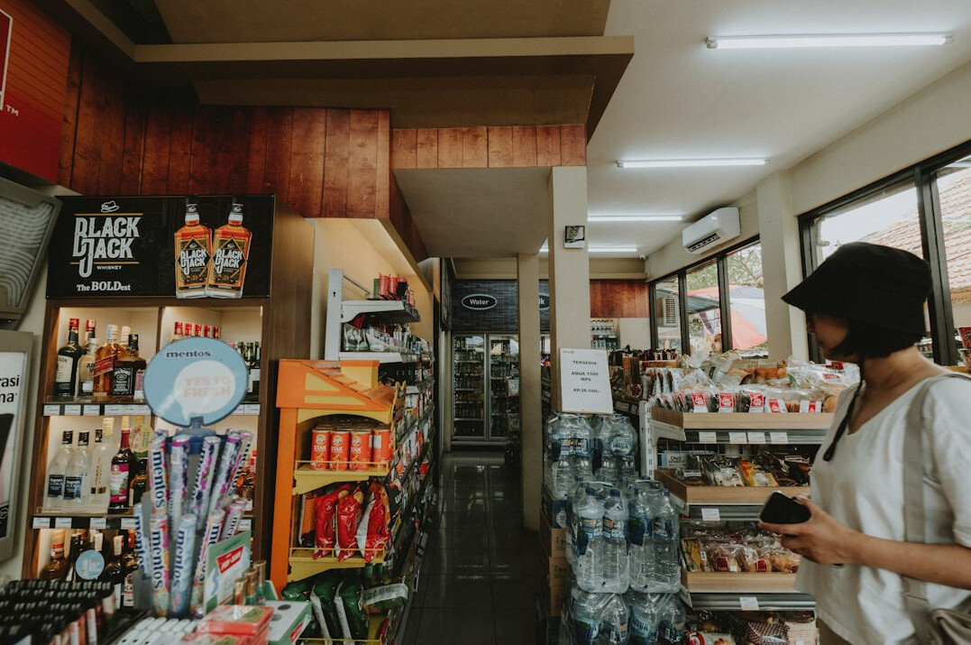 store security guard watching aisle